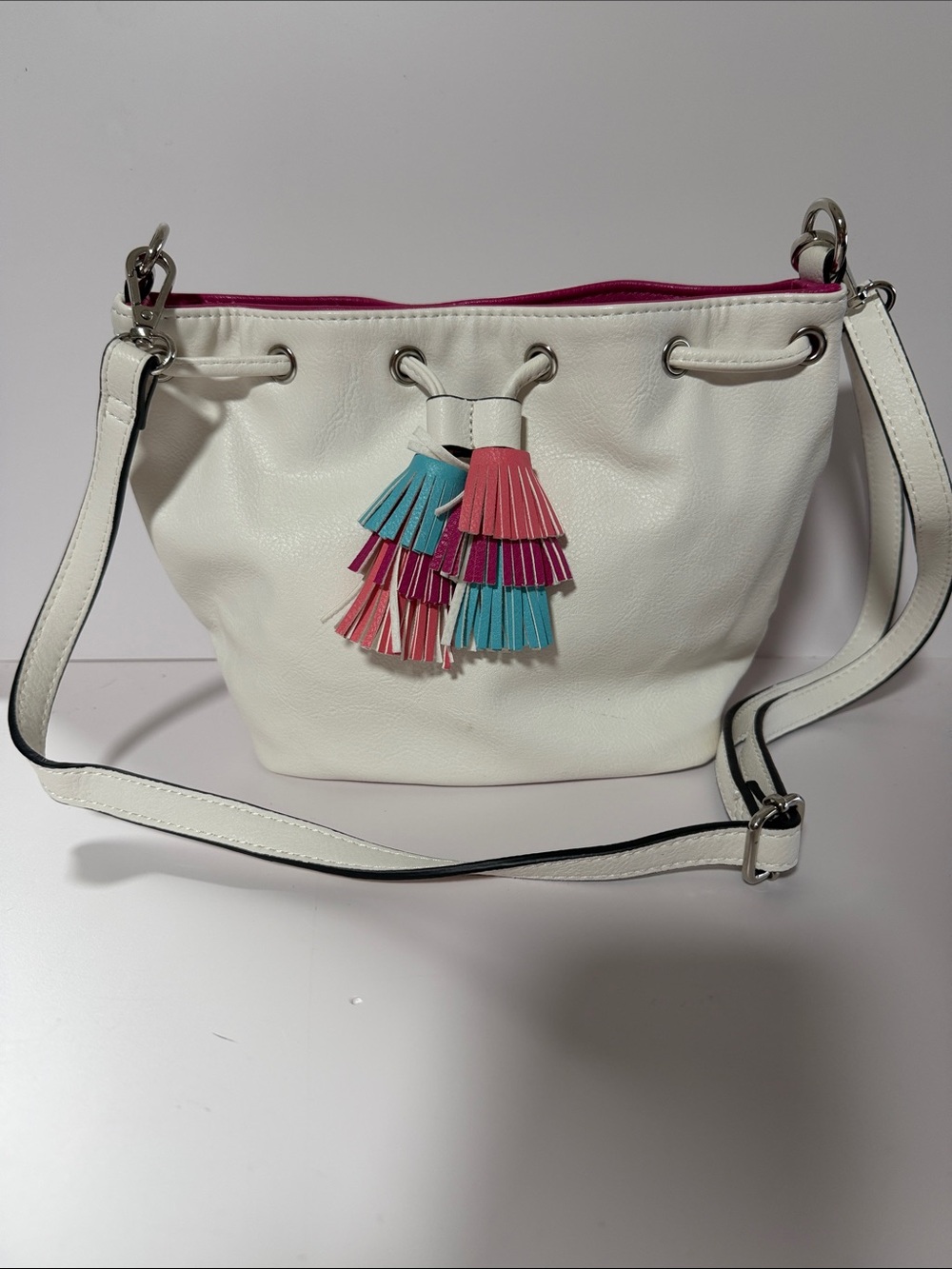 Candie's White Crossbody Bucket Bag with Pink & Teal Tassels